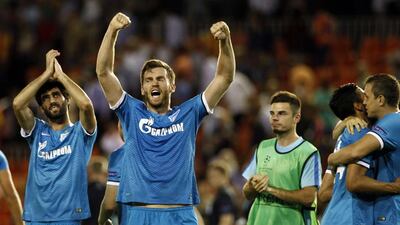 Zenit St Petersburg's Nicolas Lombaerts celebrates after beating Valencia 3-2 in their Champions League group match on Wednesday in Spain. Jose Jordan / AFP