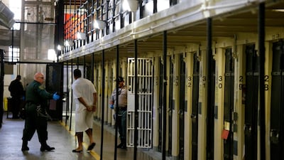A condemned inmate is led out of his cell on death row at San Quentin State Prison in California. AP