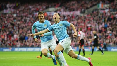 Manchester City's Samir Nasri, front, Manchester City celebrates scoring his side's second goal in a 2-1 win over Sunderland at Wembley Stadium on March 2, 2014 in the Capital One Cup final. Jamie McDonald / Getty Images