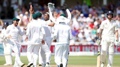 South Africa's Vernon Philander celebrates the wicket of England's Ben Stokes with his teammates at Trent Bridge on Monday. Carl Recine / Reuters