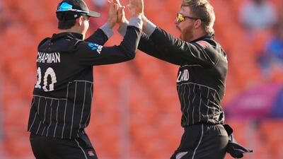 New Zealand's Glenn Phillips, right, celebrates the dismissal of England's Joe Root. AP