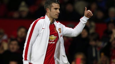 Manchester United's Robin van Persie acknowledges the crowd during his team's FA Cup replay victory on Tuesday. Phil Noble / Reuters