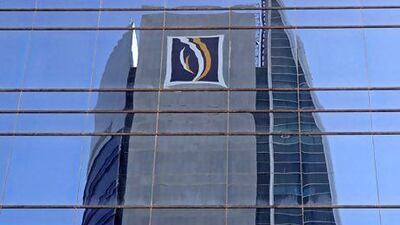 Moody's downgraded Emirates NBD, the UAE's biggest bank by assets and two other lenders because of worries about a build-up of bad loans. Jeff Topping / The National