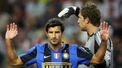 The Portuguese player Luis Figo, who turned down a move to Al Ain to stay at Inter Milan this summer, pleads his innocence during the Amsterdam Tournament clash with hosts Ajax.