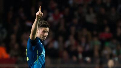 Arsenal’s Olivier Giroud celebrates after opening the scoring on Tuesday in his side’s 2-0 victory over AS Monaco in the Champions League last-16 second leg. Bertrand Langlois / AFP