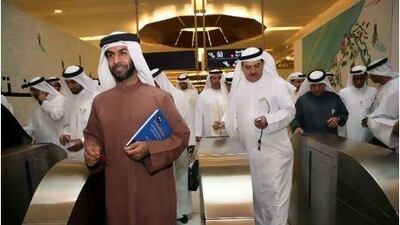 Dubai Municipality employees exiting Union Station and walking to work in support of Car Free Day.