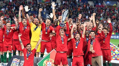 Portugal's Cristiano Ronaldo lifts up the trophy after winning the inaugural Uefa Nations League final on Sunday. AP