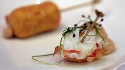 Vincent Pouessel’s Maine lobster corn dog with tarragon espuma.