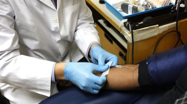 An employer is only legally obligated to provide medical cover at the minimum stated level. Pawan Singh / The National