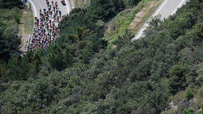 The peloton ride during the 184.5km ninth stage of the 103rd Tour de France cycling race on July 10, 2016 between Vielha Val d’Aran and Andorre Arcalis. Jeff Pachoud / AFP