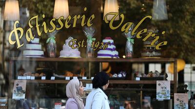 Women walk past a branch of Patisserie Valerie in London. The company said it would go out of business unless it secured an “immediate injection of capital”. Reuters