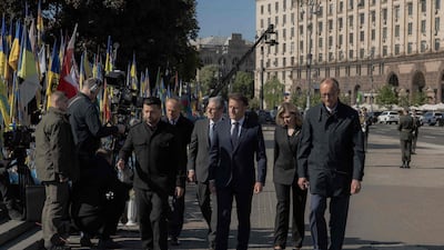 From left, Mr Zelenskyy, Mr Tusk, Britain's Prime Minister Keir Starmer, Mr Macron, Ukraine's first lady Olena Zelenska, and Mr Merz. AFP