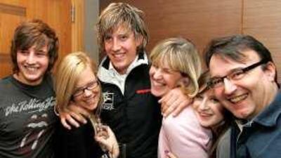 Luke Porter, third from left, one of the five British yachtsman detained in Iran poses with his family in London yesterday.