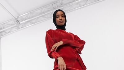 In deep rust, this dress is part of the edit by Shahd Batal for Asos