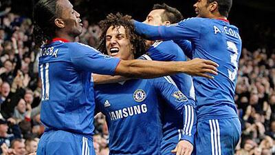 Chelsea's David Luiz, centre, celebrates his goal against Manchester City with teammates (from left) Didier Drogba , John Terry and Ashley Cole. Ian Kington /AFP