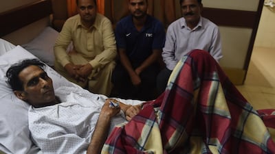 Pakistani former hockey goalkeeper Mansoor Ahmed is being treated at a hospital in Karachi at the moment. Rizwan Tabassum / AFP