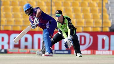 Mohammad Shahzad of Deccan Gladiators hit 57 against Qalandars in the Abu Dhabi T10 on Tuesday. Pawan Singh / The National