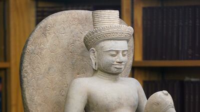 This 10th century sandstone statue depicting the Hindu god of war, Skanda, riding on a peacock will be returned to Cambodia. AP