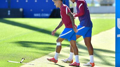 Barcelona's Brazilian midfielder Philippe Coutinho and Uruguayan defender Ronald Araujo. AFP