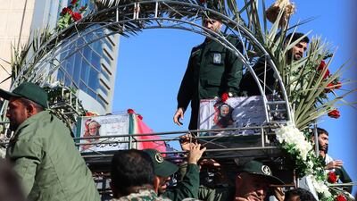 The coffins of Qassem Suleimani (right) and Abu Mahdi Al Muhandis are transported atop a vehicle upon their arrival at Ahvaz International Airport in southwestern Iran. AFP