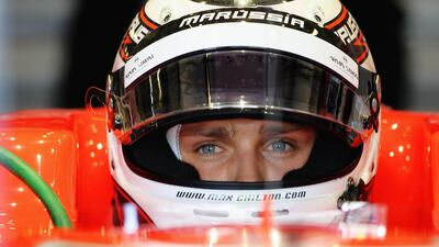 Max Chilton prepares to drive for Marussia during practice at the Yas Marina Circuit. Ker Robertson/Getty Images