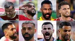 Top row: Qatar's Boalem Khoukhi, Morocco's Ismael Saibari, Saudi Arabia's Mohammed Al Owais, Tunisia's Omar Rekik; bottom row: Jordan's Ali Olwan, Egypt's Mohamed Salah, Iraq's Aymen Hussein, Algeria's Riyad Mahrez.
