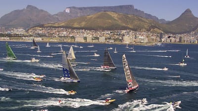 Beneath the backdrop of Table Mountain, yachts competing in the round-the-world Volvo Ocean Race leave Cape Town, South Africa, on the second leg of the race to Sydney, Australia, on November 11, 2001. Mike Hutchings / Reuters