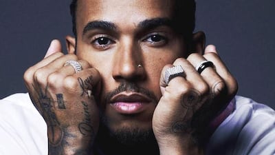 Formula One champion Lewis Hamilton has a nose and ear piercing, plus a whole bunch of bling on his hands. Instagram / @lewishamilton.