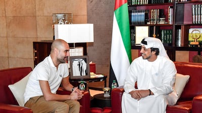 Sheikh Mansour bin Zayed, Deputy Prime Minister and Minister of Presidential Affairs, and owner of Manchester City Football Club, meets with Pep Guardiola, Manchester City FC manager, in Abu Dhabi on Wednesday. Wam