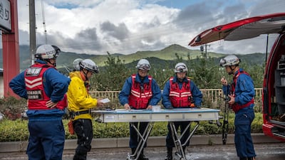 Rescue workers set up a command post as the search continues for missing people after heavy flooding caused by Typhoon Hagibis in Hoyasu near Nagano, Japan. Japan has mobilised over 100,000 rescue workers after Typhoon Hagibis, the most powerful storm in decades, swept across the country killing 66 people and leaving thousands injured and homeless. Getty Images