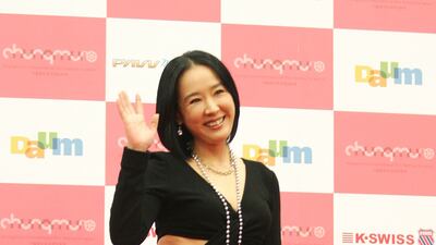 Kang, who died of a cerebral haemorrhage on May 7, 2022, arrives at the opening ceremony of the first Chungmuro International Film Festival in Seoul, South Korea, in October 2007. Getty Images