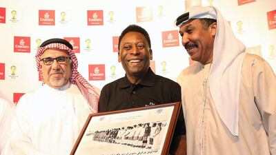 Among the few functions Pele attended while in Dubai, he received old pictures of the Al Nasr football club from former players. Afsal Sham / Al Ittihad