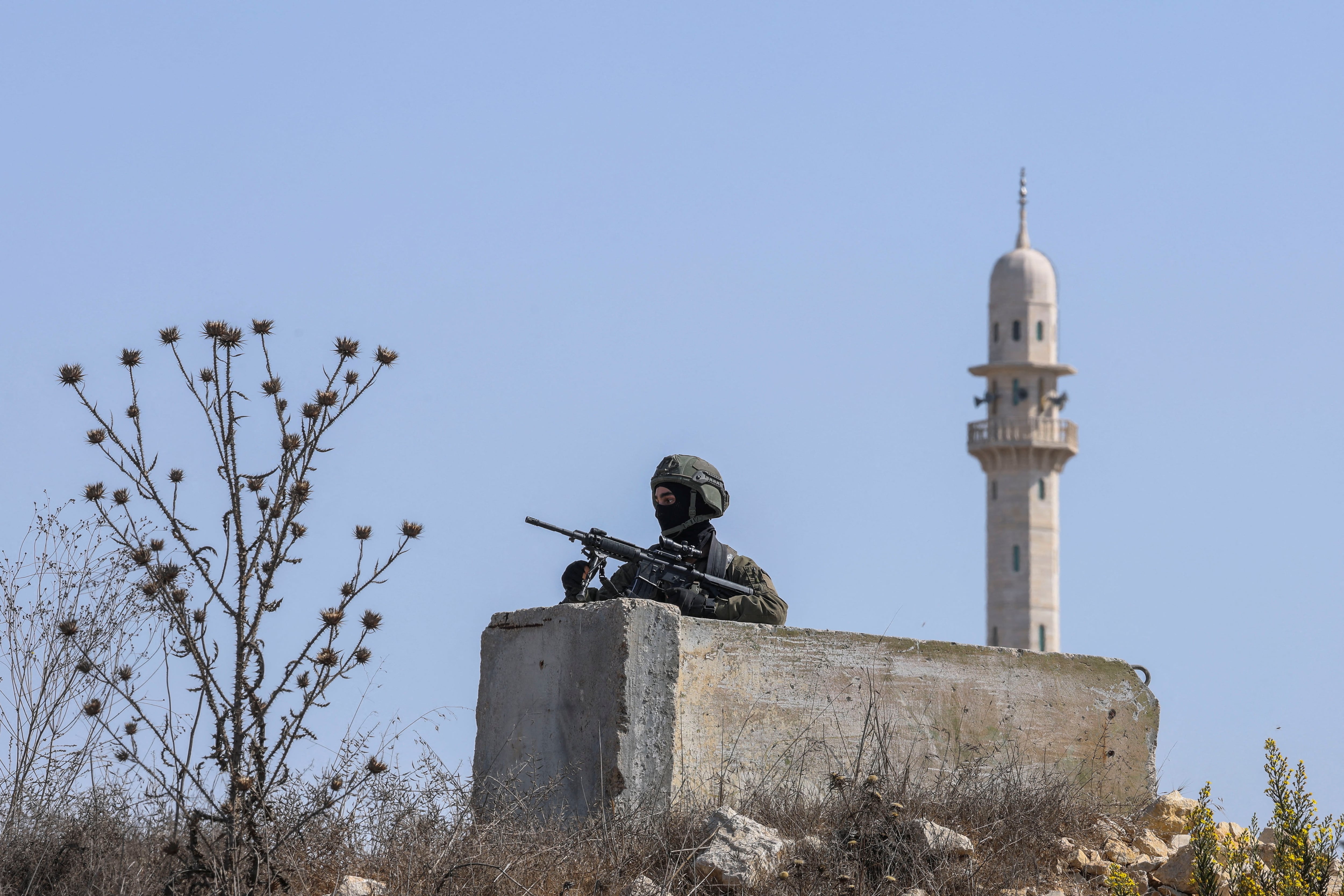 An Israeli soldier following a shooting in Hebron in the occupied West Bank. Reuters