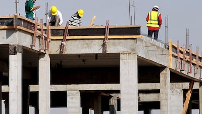 Work under way at a construction site in the Saudi Arabian capital, Riyadh. The kingdom is amending laws to boost foreign investment in real estate. AFP