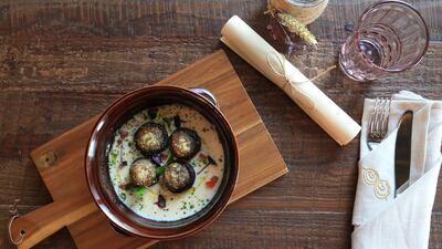 The menu's emphasis is on authentic regional dishes, such as this Funghi Gratinati. Courtesy Ravioli & Co