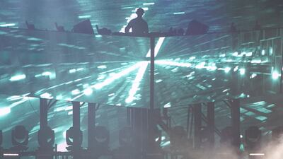 UK DJ Calvin Harris was a shadowy presence at his Etihad Park concert in 2017. Reem Mohammed / The National