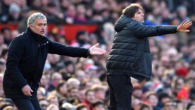 Jose Mourinho and Chelsea manager Antonio Conte on the touchline during the Premier League match between Manchester United and Chelsea at Old Trafford on February 25, 2018. AFP