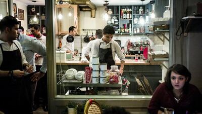 The retro-inspired interior design of Kazouza creates a unique atmosphere in the upper class Maadi neighbourhood as diners gather for their last meal before sunrise during Ramadan. David Degner for The National