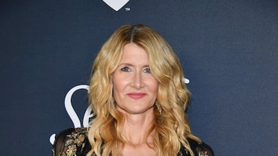 Laura Dern poses with her award for Best Performance by an Actress in Supporting Role in Any Motion Picture for her role in 'Marriage Story' during the 77th annual Golden Globe Awards on January 5, 2020, at The Beverly Hilton hotel in Beverly Hills, California. AFP