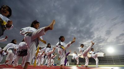 Residents of Al Ain came out in their numbers to support National Sports Day on Wednesday, relishing the mild afternoon weather and breeze as the sun set over the city. Satish Kumar / The National