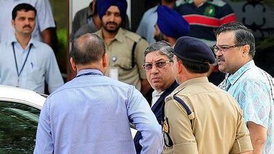 N Srinivasan, centre, has pulled strings to et re-elected to a third year in his term as BCCI president. AP Photo