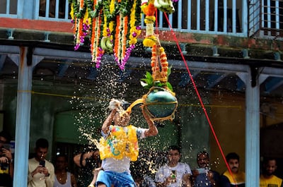 The festival marks the birth of Hindu god Krishna and the act seeks to reenact the story of Lord Krishna stealing butter during his childhood. Getty