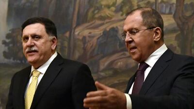 Russian foreign minister Sergey Lavrov (R) shows the way to Fayez Al Sarraj, head of the UN-backed Libyan government, during their meeting in Moscow on March 2, 2017. Yuri Kadobnov / AFP Photo