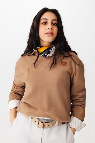 Cashmere polo sweater; pinstriped poplin shirt; micro pinstriped poplin trousers; printed silk scarf; and leather belt, all from Miu Miu