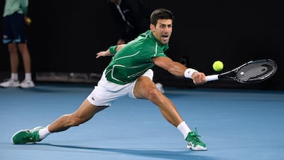 Novak Djokovic makes a backhand return. AP