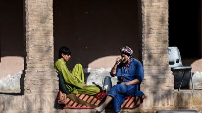 Afghan workers on a break at a shop in Herat citadel, also known the Citadel of Alexander and locally known as Qala Iktyaruddin, in Herat, western Afghanistan. AFP