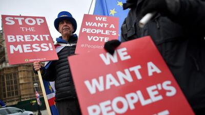 The uncertainty about the Parliament vote has driven the pound down for a third consecutive week toward $1.27. AFP