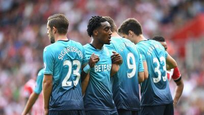 Swansea City players form a wall during the Premier League match against Southampton. Michael Regan / Getty Images