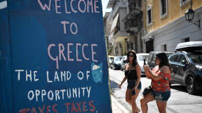 A wall in Athens, Greece. Although the country’s economic recovery is gathering pace, it’s still rebounding from a devastating recession. AFP