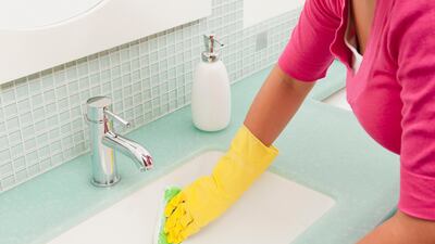 Woman cleaning. Getty Images